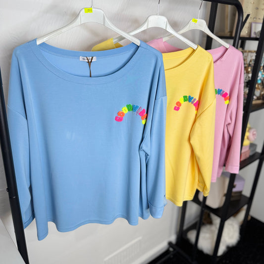 Astrid Multicoloured Good Vibes Oversized Top with Rainbow Embroidery in Blue Yellow and Pink